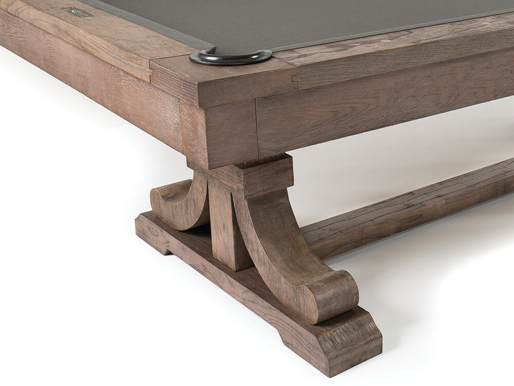 Carmel corner close up - comp close up image of a wooden leg which is curled at the bottom
