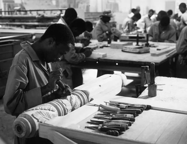 Men working in a wood work shop