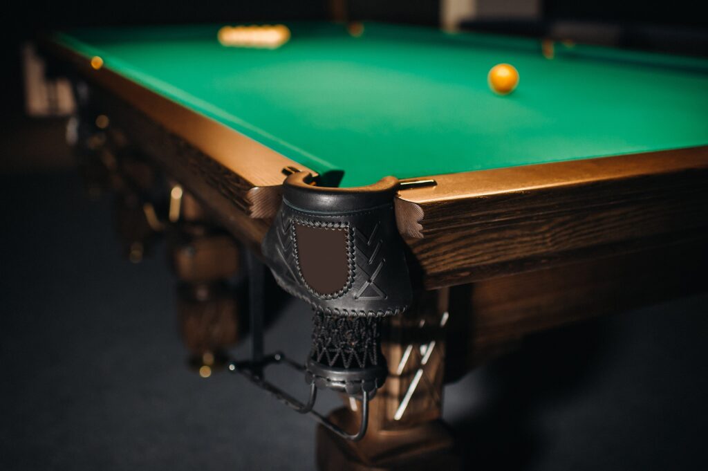 billiard-table-with-green-surface-and-balls-in-the-2021-09-04-08-16-12-utc-min Billiard table with green surface and ball