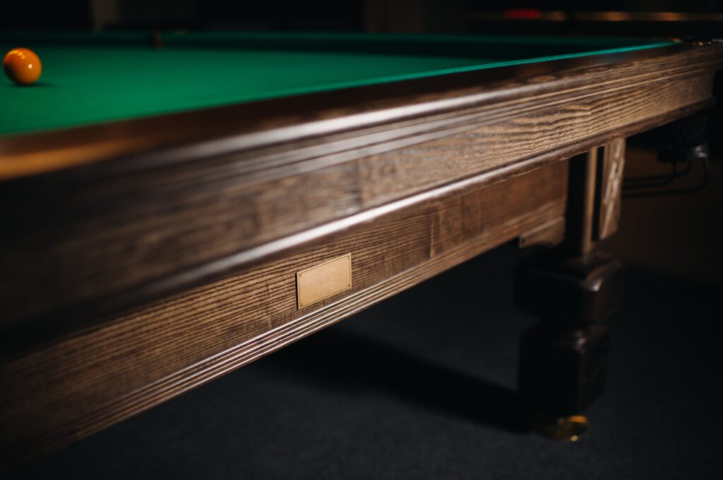 the-oak-decorative-leg-of-a-billiard-table-looks-e-2021-12-13-18-48-03-utc-min The oak decorative leg of a billiard table